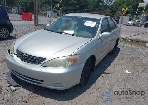 2003 Toyota Camry Le z USA, uszkodzony, nr VIN 4T1BE32K43U787019